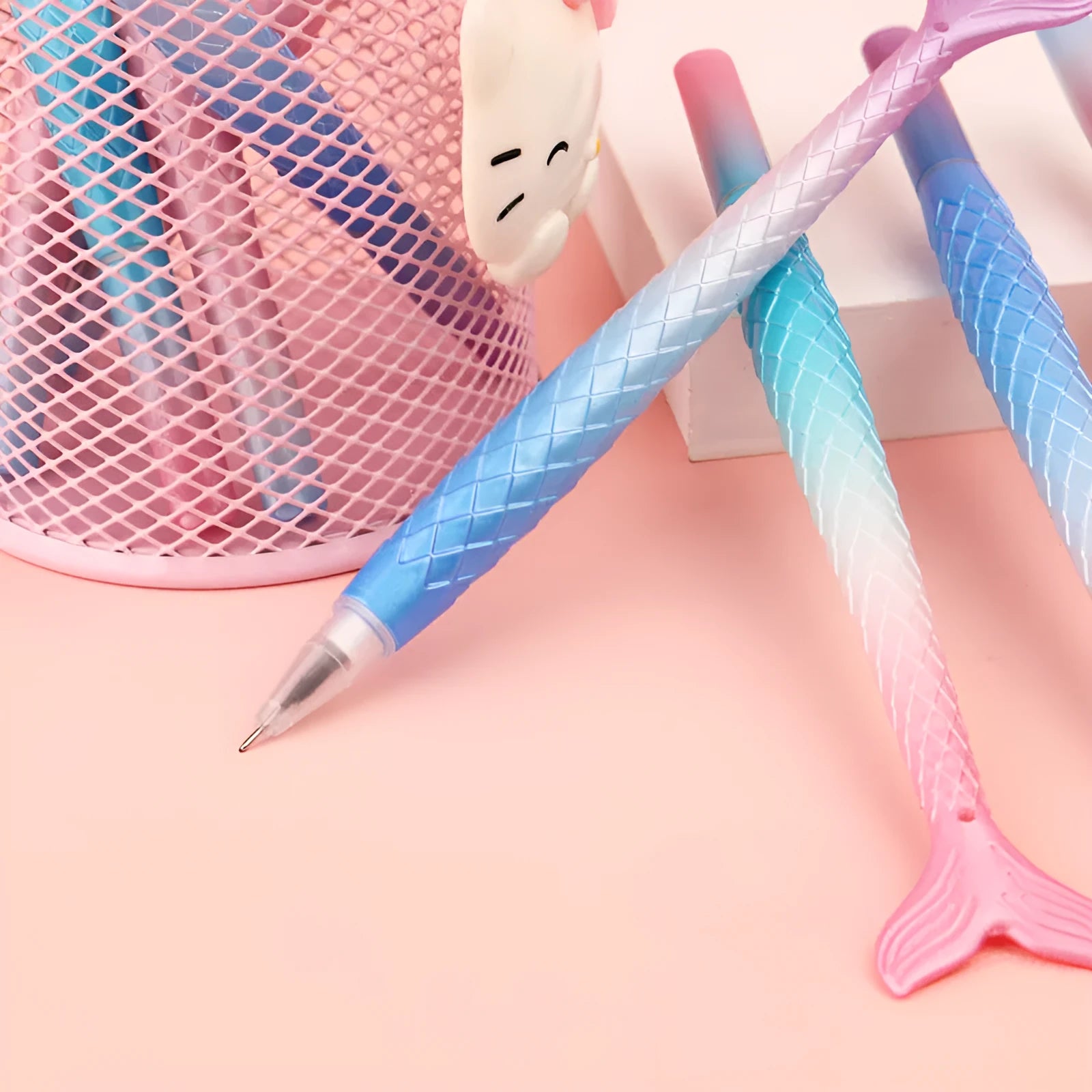 0.38mm fine point ballpoint pen with mermaid cartoon design showing plastic shell construction