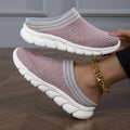 Women's black flyknit slippers with hollowed-out pattern and a height-increasing viscose sole.