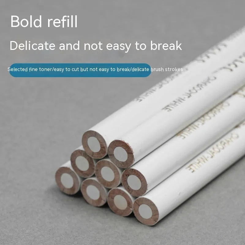 Set of three white charcoal highlighting pencils with wooden shells and brush tips for drawing