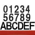 Black stainless steel self-adhesive house number sign showing the digit 7, 7.5cm tall.