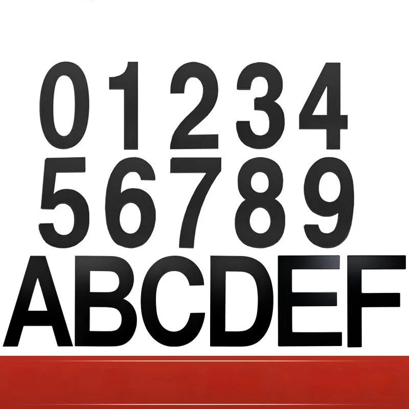 Black stainless steel self-adhesive house number sign showing the digit 7, 7.5cm tall.