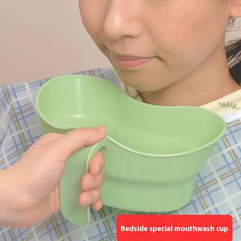 Green plastic gargle cup for bedridden patient nursing care