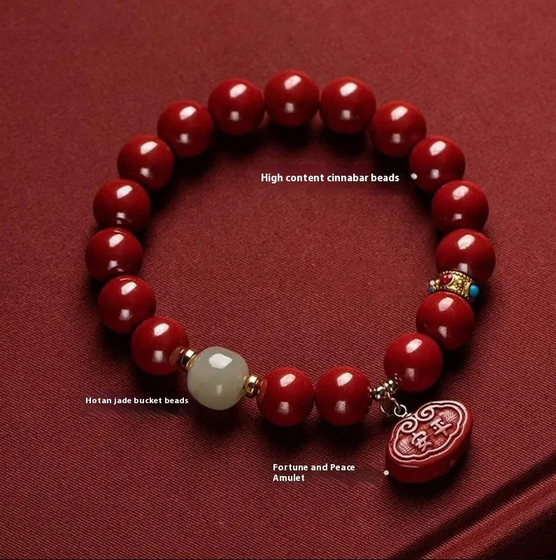 Natural red cinnabar bracelet with Ping An Fu Lu symbol carved in emperor sandstone style.