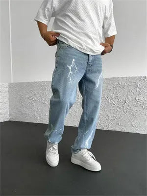 Blue men's straight-leg denim jeans with mid-waist fit and zipper fly displayed flat