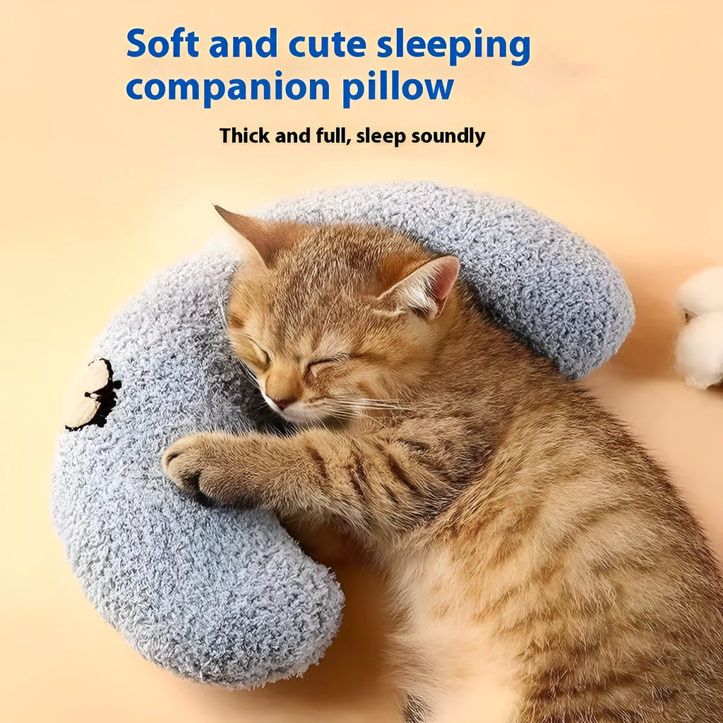 Blue U-shaped cat pillow with neck support in a question mark shape on a white background.