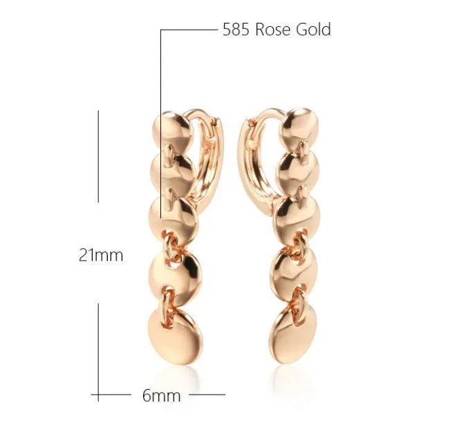 Retro gold-coloured copper circle earrings with woven texture and long dangle design