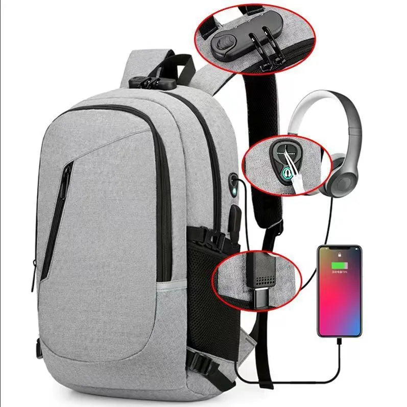Grey Oxford cloth computer backpack for men on a table, showing front view and size.