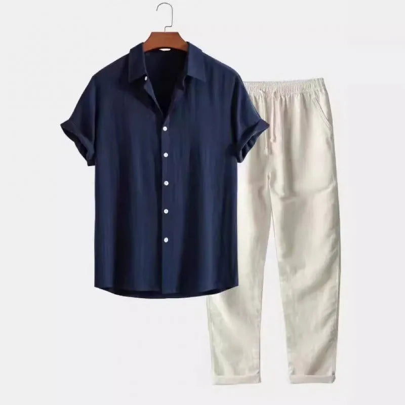 Man wearing a loose-fit short-sleeve shirt and trousers from a casual linen-blend suit set.
