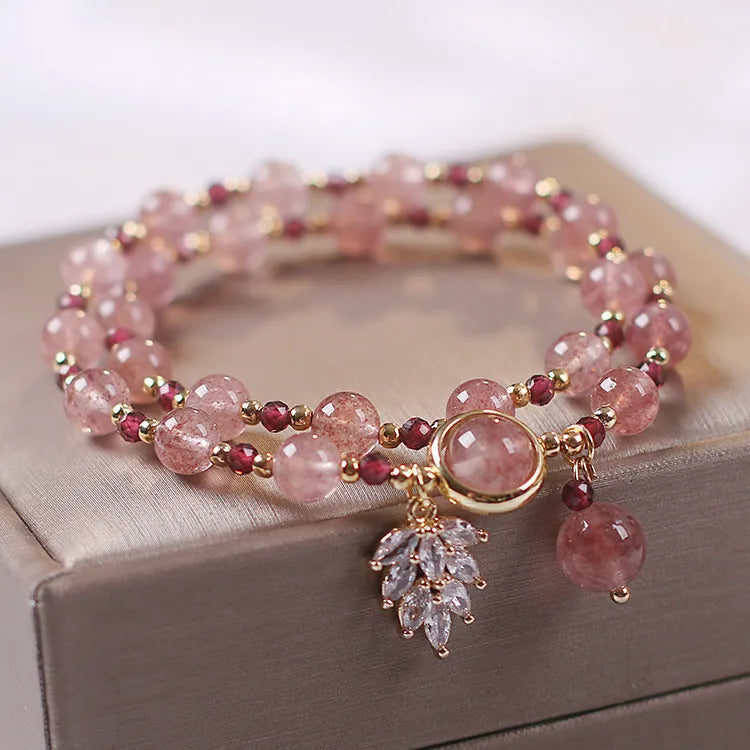 Double layer crystal bracelet with lucky cat charms and red cat's eye flower beads