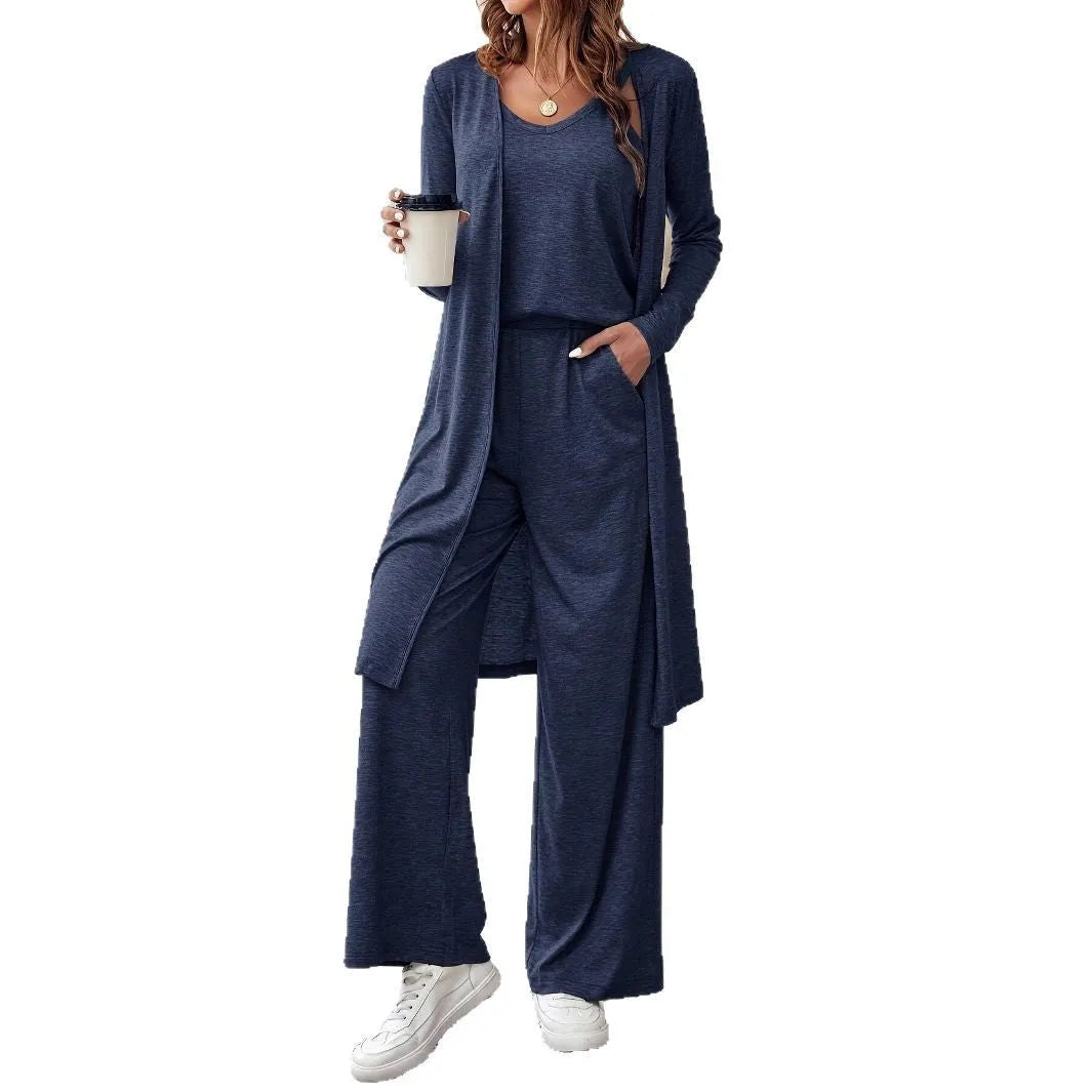 Blue women's three-piece co-ord set showing sling top, long cardigan, and trousers