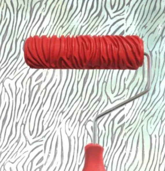 Red 7 inch paint embossing roller with rubber textured pattern surface for creating wall designs
