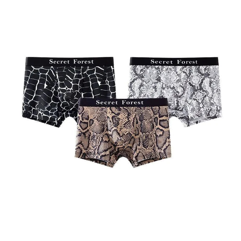 Men's loose-fit polyester boxer shorts in black, shown laid flat to display the thin fabric and mid-waist design.