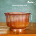 Large antique carved ceramic flower pot in purple sand clay with classical styling for indoor plants