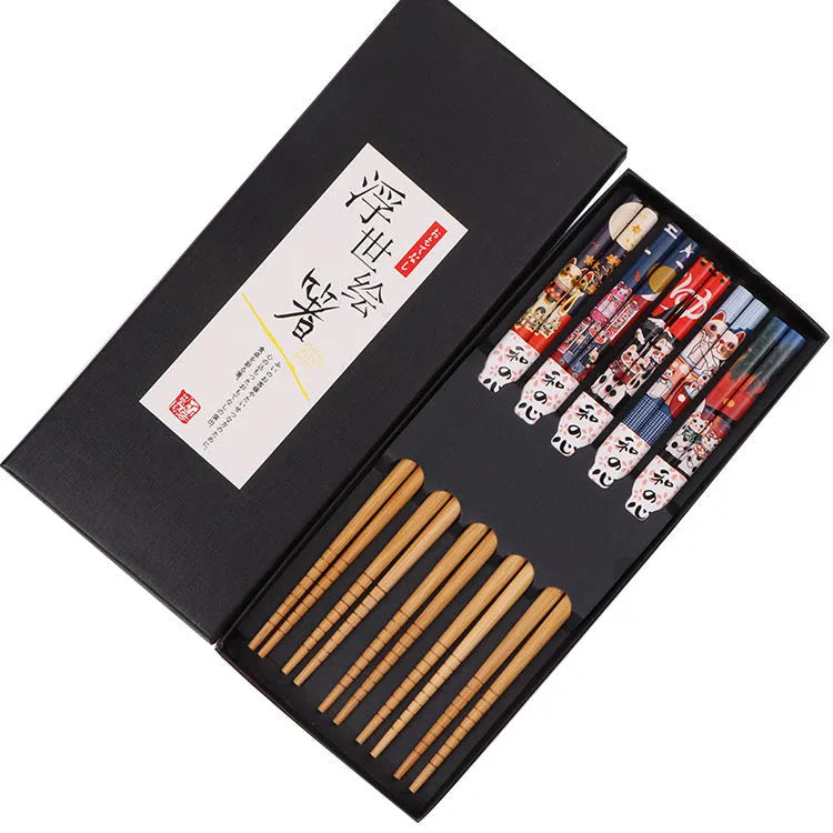 Set of five Japanese style patterned bamboo chopsticks showing lucky cat and pool elegant blue cartoon designs.
