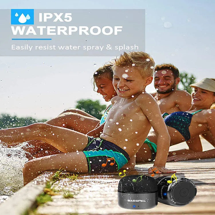 Black portable mini Bluetooth speaker with waterproof rating and button controls