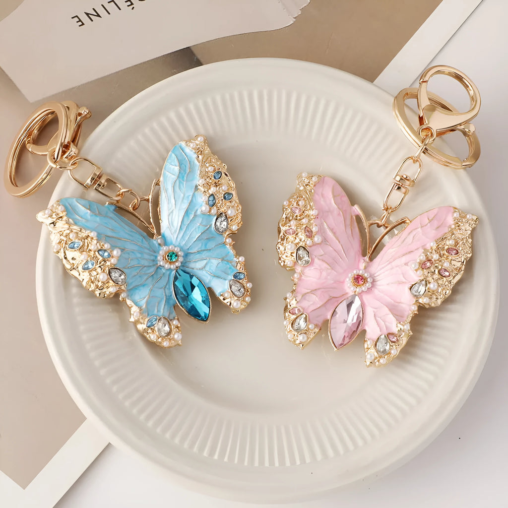 Enamel dripping oil butterfly brooch keychain in pink or blue, dual purpose European style metal accessory.