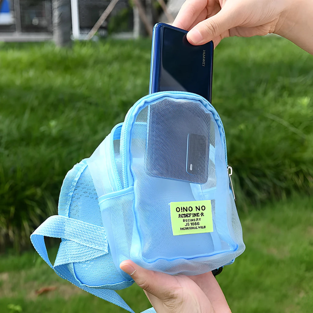Solid-colour breathable dog carrier backpack for hands-free pet transport in blue, purple, black, or dark grey.