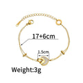 Women's stainless steel bracelet with electroplated finish and a double-layered resin heart charm.
