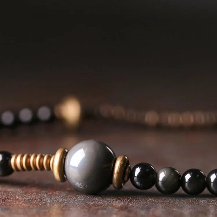 Black geometric beaded bracelet with layered design and natural style jewellery