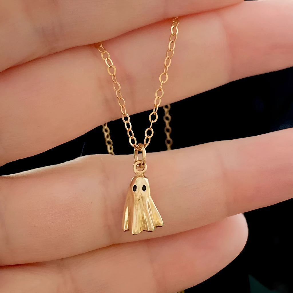 A titanium steel ghost pendant necklace on a choice of stainless steel chain styles.