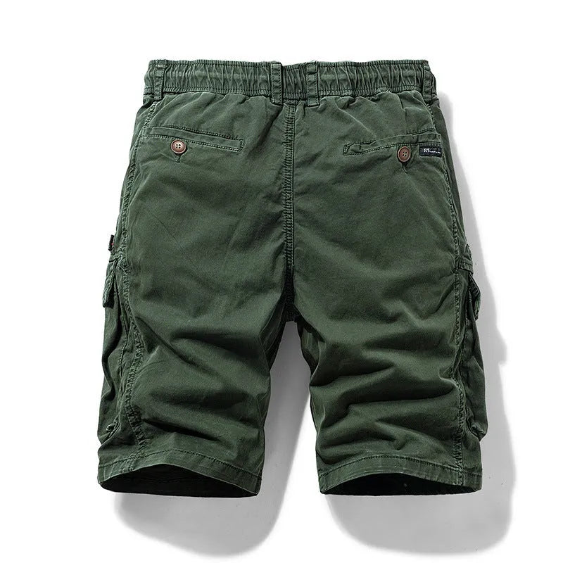 Men's cotton multi-pocket shorts with zipper closure in Army Green colour showing Korean style fifth pants length