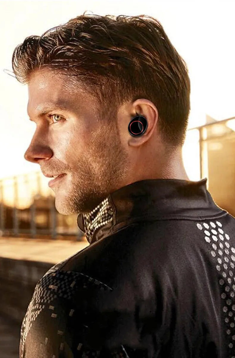 Black X11 Bluetooth wireless earbuds with charging case and silicone ear tips
