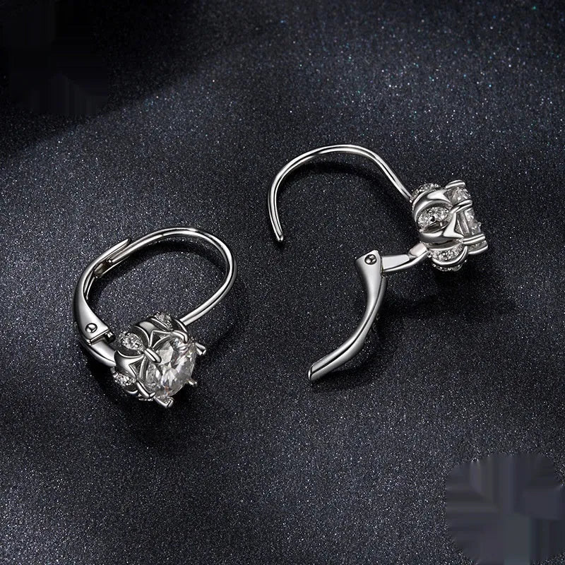 Sterling silver flower bud ear clip earring with white gold plating and moissanite stones