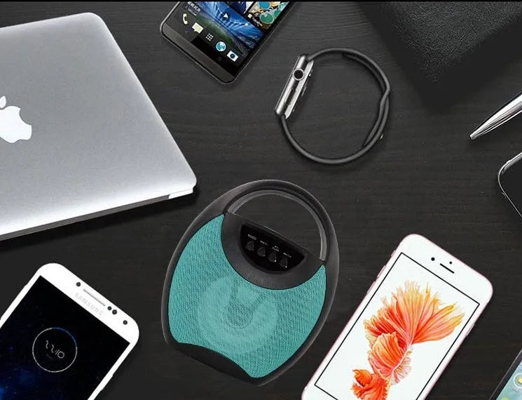 Portable Bluetooth speaker in black, blue, or pink with USB and SD card slots