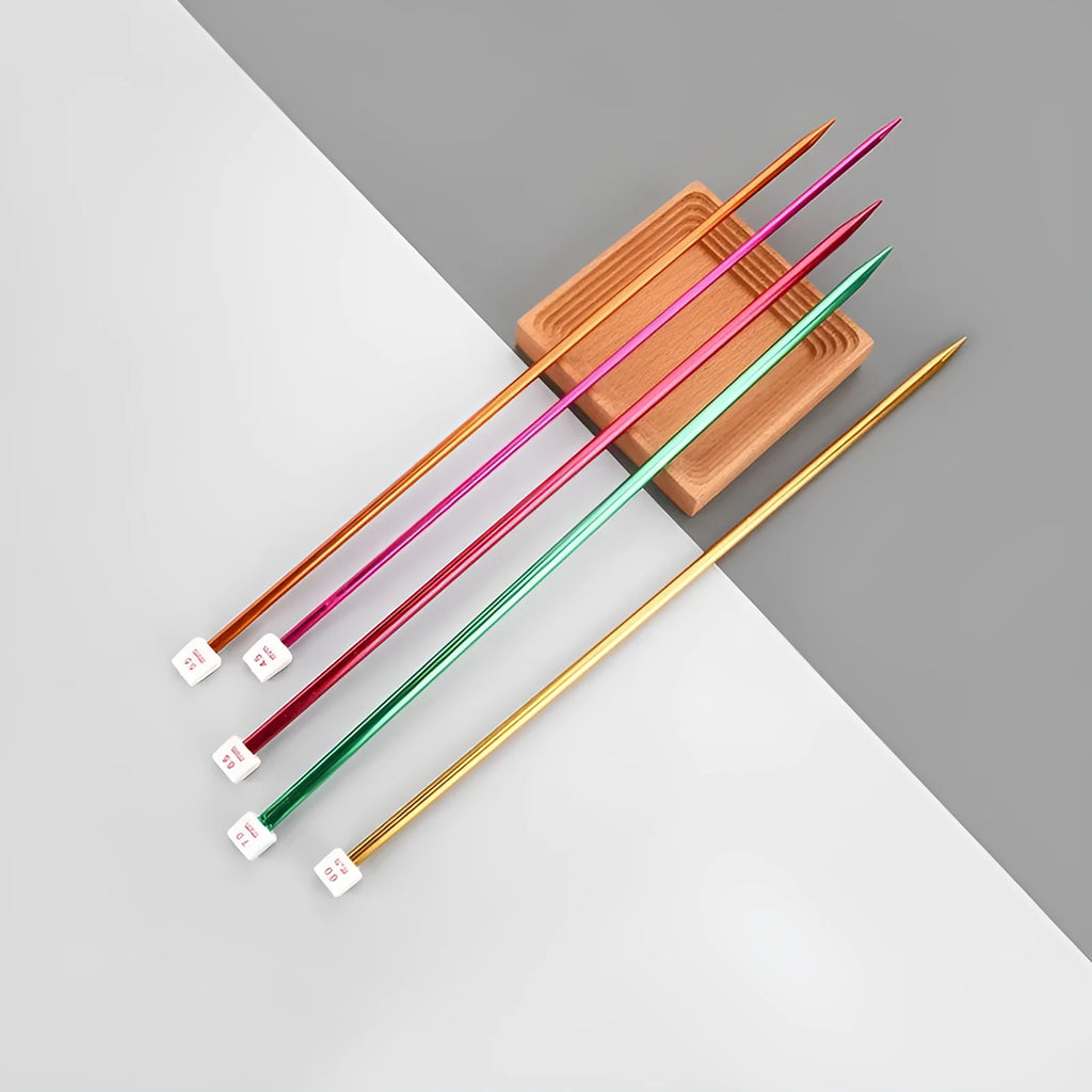 Set of lengthened crochet hooks in various sizes from 2.0mm to 10.0mm with protective end caps.