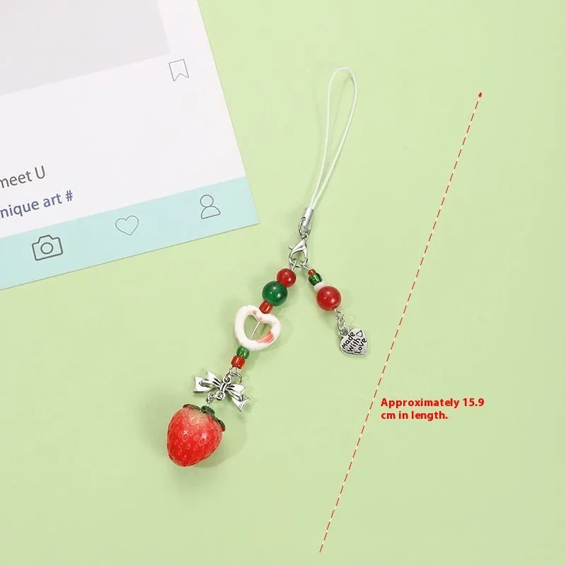 Plastic resin mobile phone charm keychain with fruit designs including apple and strawberry patterns