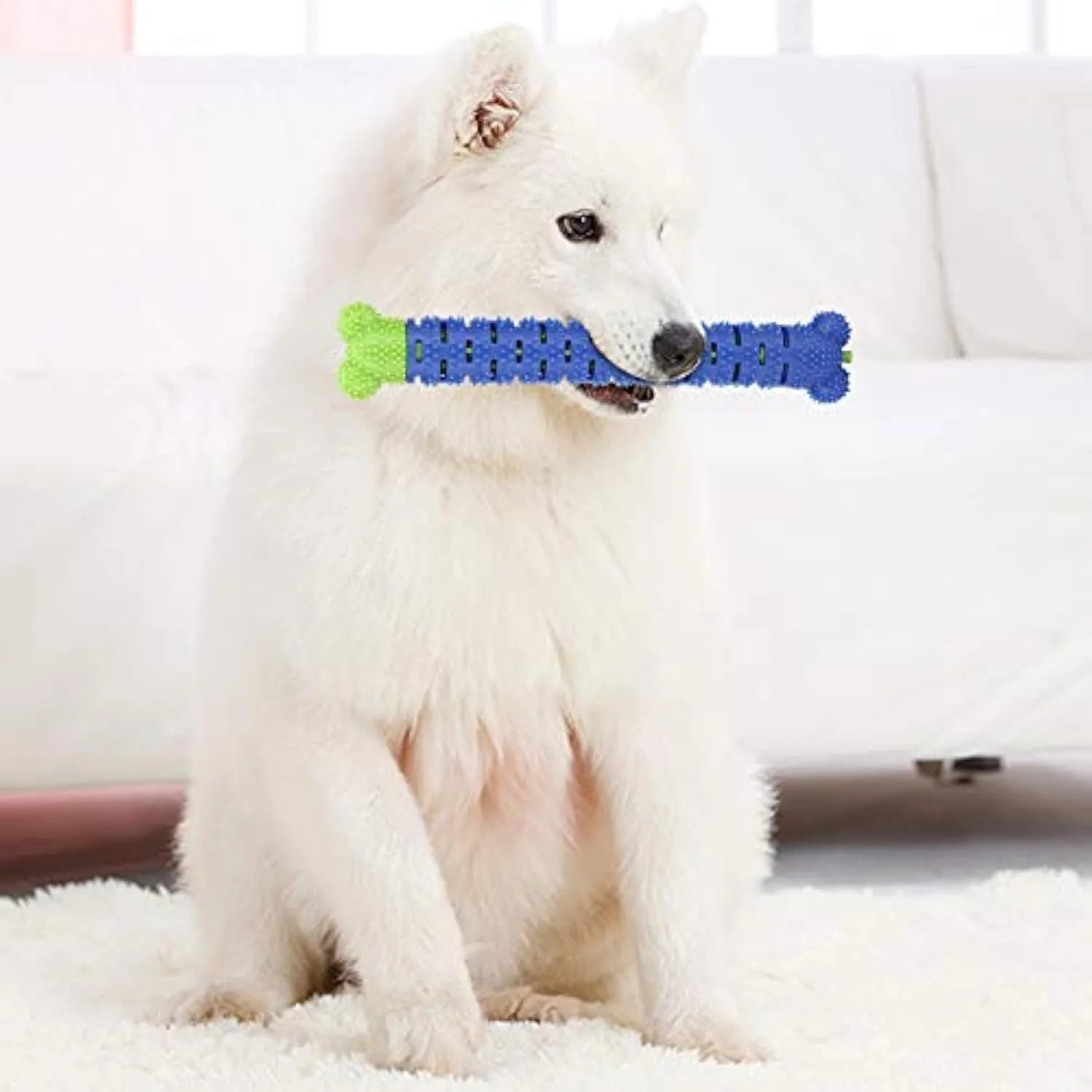 Blue green dog dental cleaning stick toy with serrated brush head and massage nodules