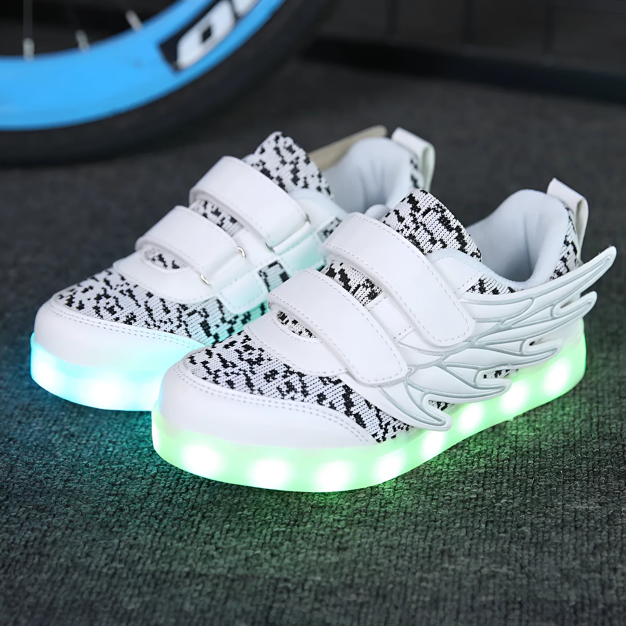 Children's plum red and white LED light-up sneakers with USB charging port and hidden colour selection switch