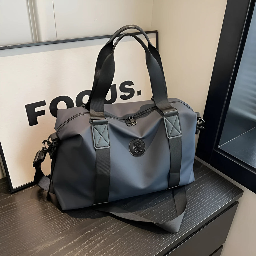 36-55L waterproof Oxford cloth travel bag with breathable back panel in black, grey, red or blue colour