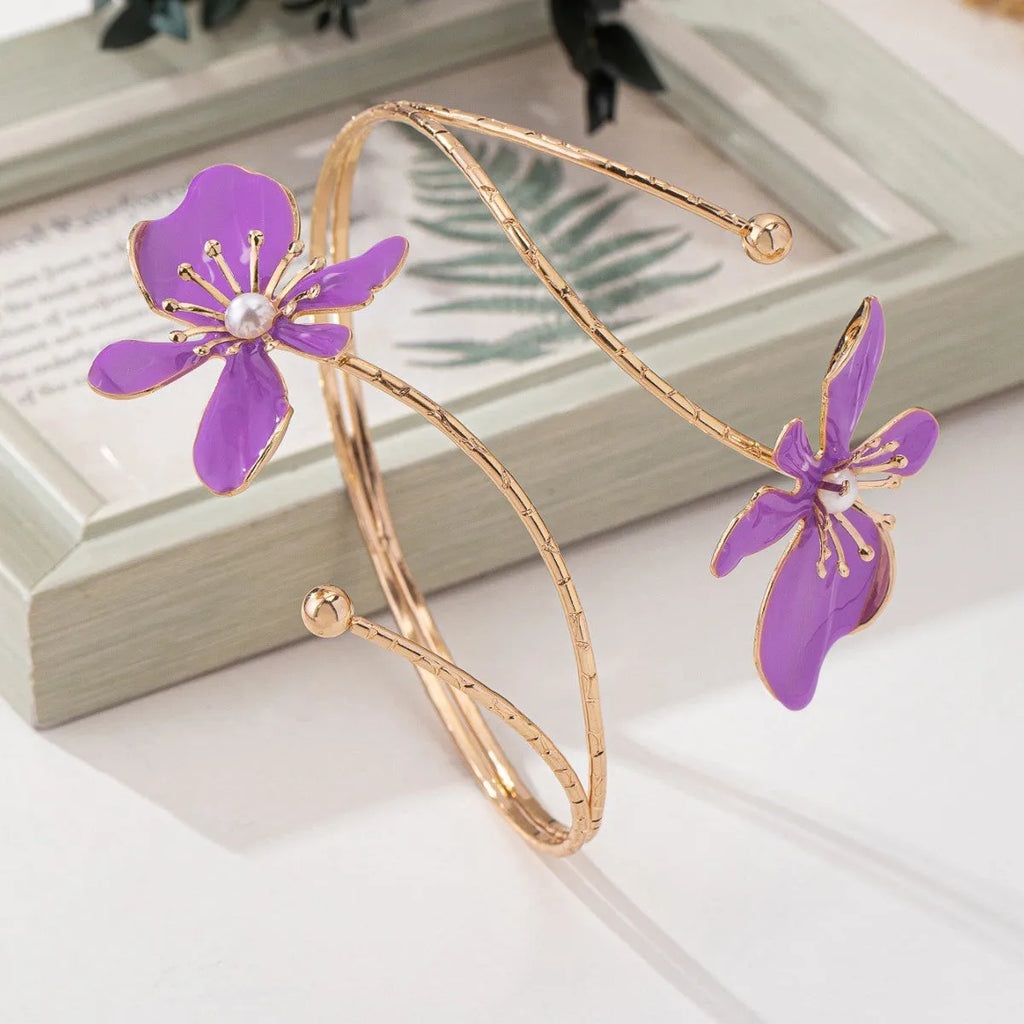 Pink alloy armband jewellery with hollow pattern design lines for fashion wrist accessory