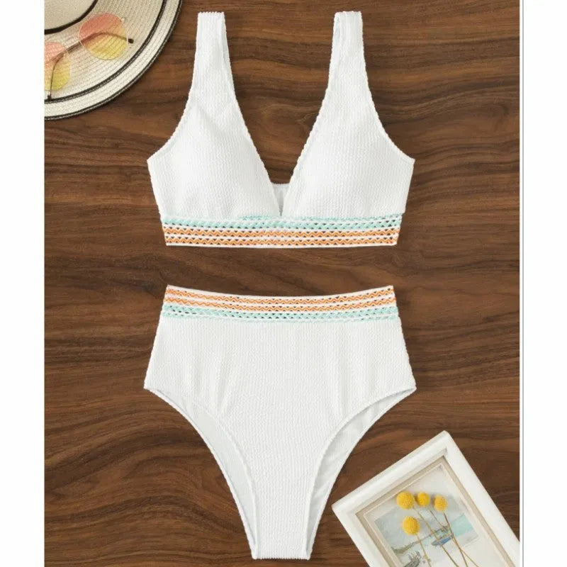White high waist split bikini set on a mannequin, showing briefs style.