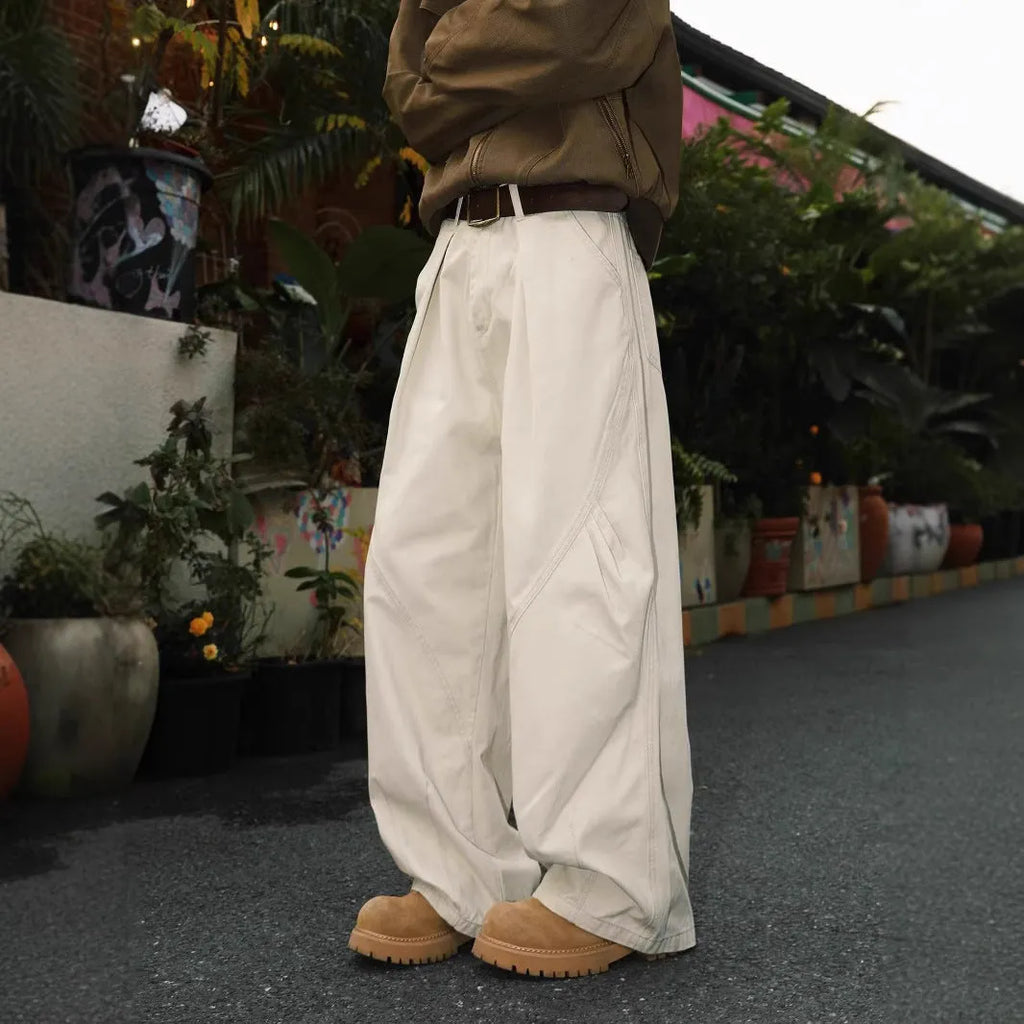 Men's loose straight leg trousers with pleats and stripes in apricot, black, and brown colours