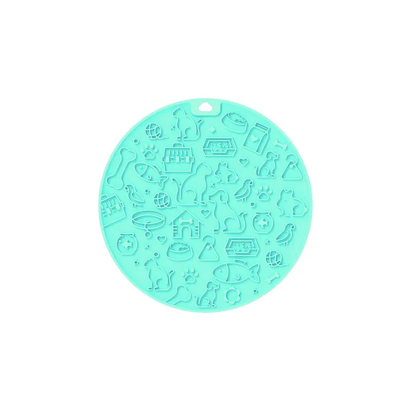 Round blue silicone pet licking mat for cats and dogs on a white background.