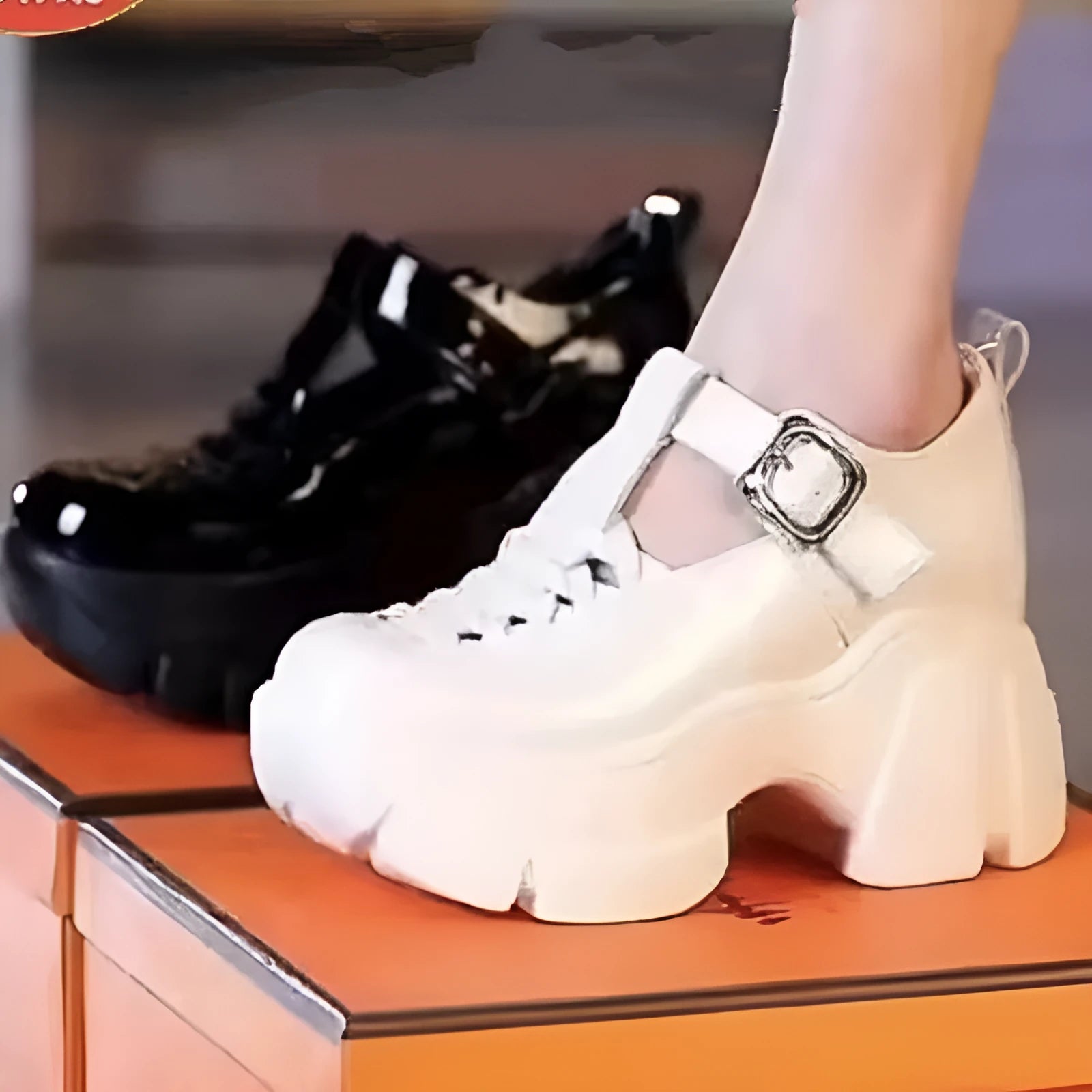 Women's black Roman style pumps with a skull pattern, wedge heel, and satin upper.