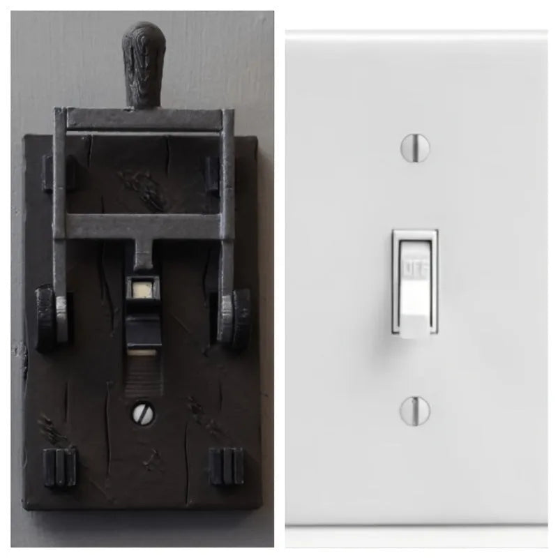 Retro-style white mechanical light switch panel for exposed wall mounting.