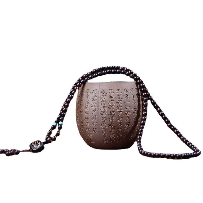 Zambian rosewood bead bracelet with flat lotus pendant showing 108 individual 0.6cm wooden beads