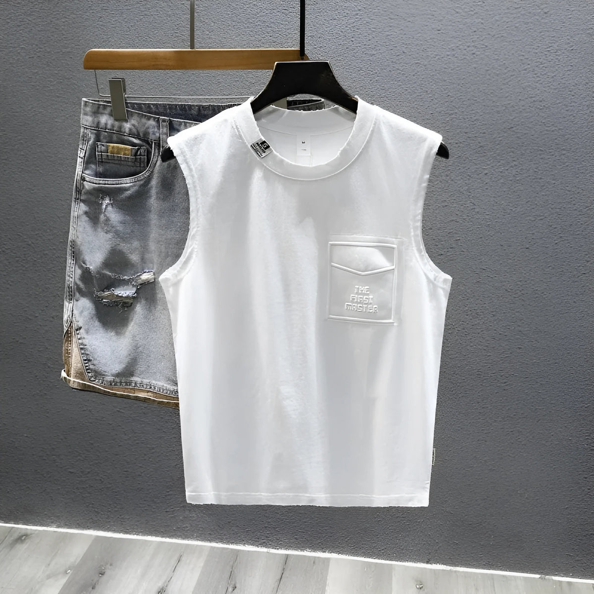 Cotton sleeveless t-shirt in loose fit with straight hem, available in white or black colours