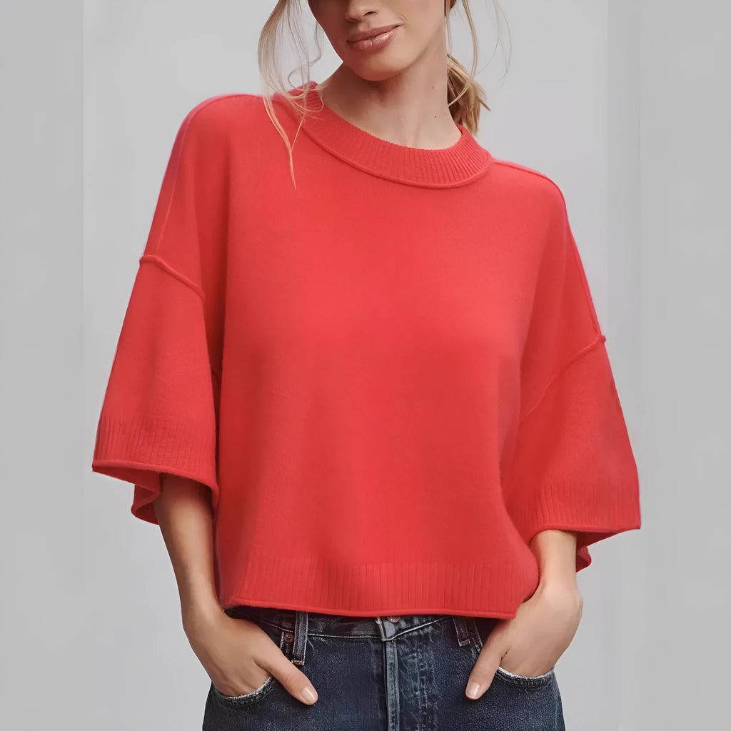 Red cropped T-shirt with exposed navel detail on mannequin