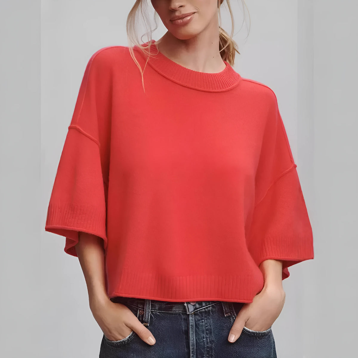 Red cropped T-shirt with exposed navel detail on mannequin