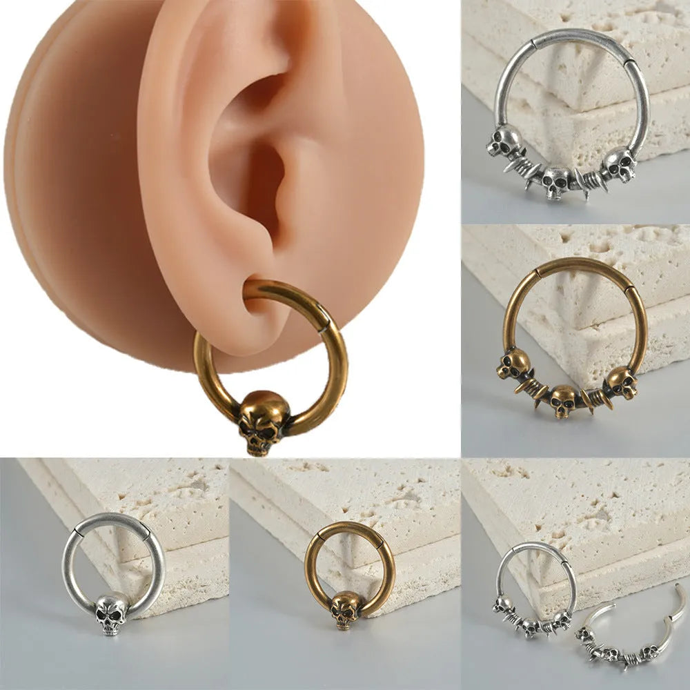 Copper ghost head punk earrings in antique silver and ancient gold finishes