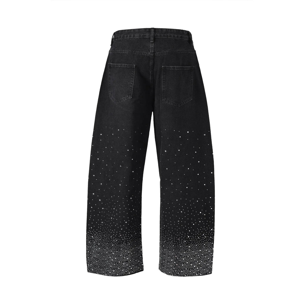 Blue loose-fitting wide-leg cotton trousers laid flat, showing the high street casual style.