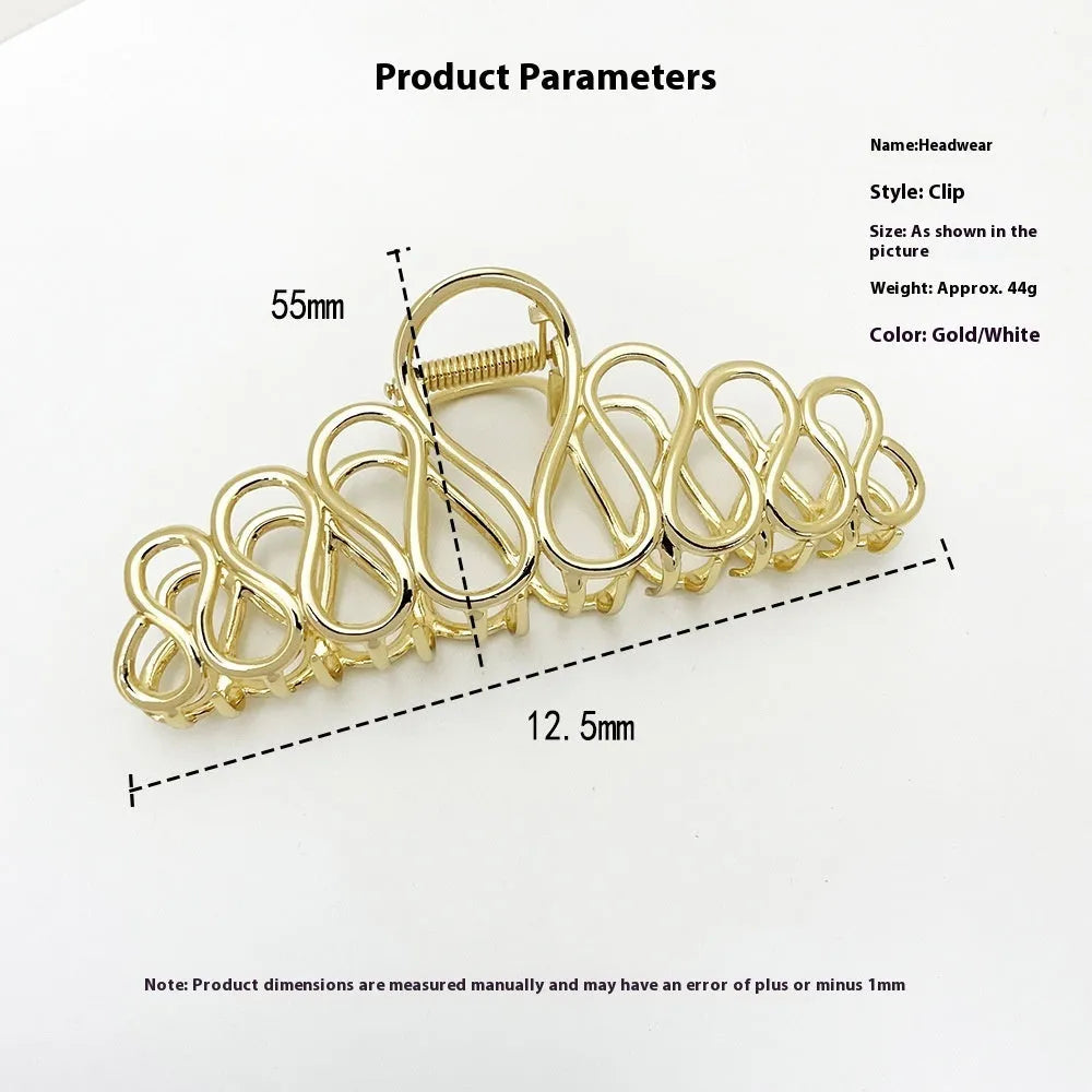Minimalist large hair clip in gold electroplated alloy with tassel detail for thick hair