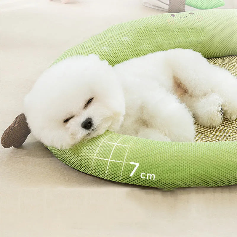 Green pet cooling mat and nest bed with fruit-shaped backrest for dogs or cats.