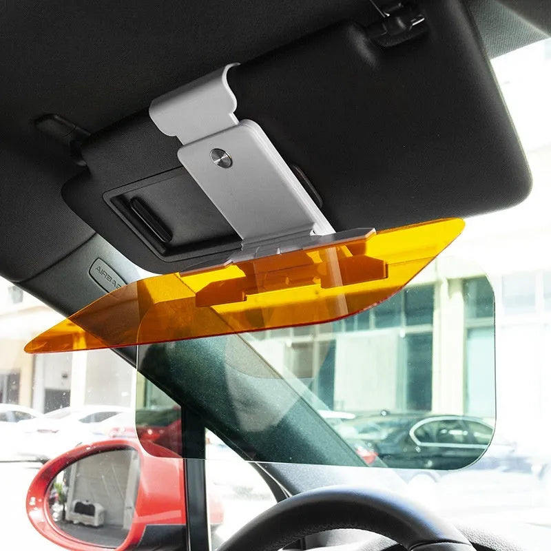 Car sun visor with anti-high beam goggles showing acrylic lens and telescopic mount for universal vehicle fit.