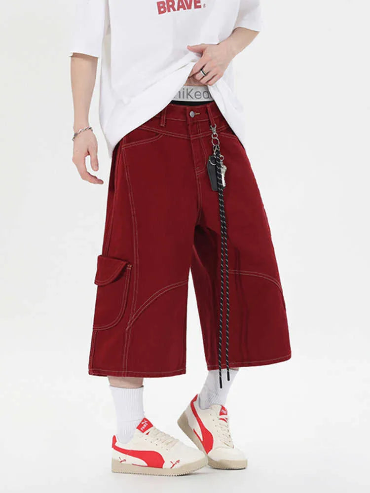 Retro denim workwear shorts with multiple pockets and wide leg cropped design in black colour