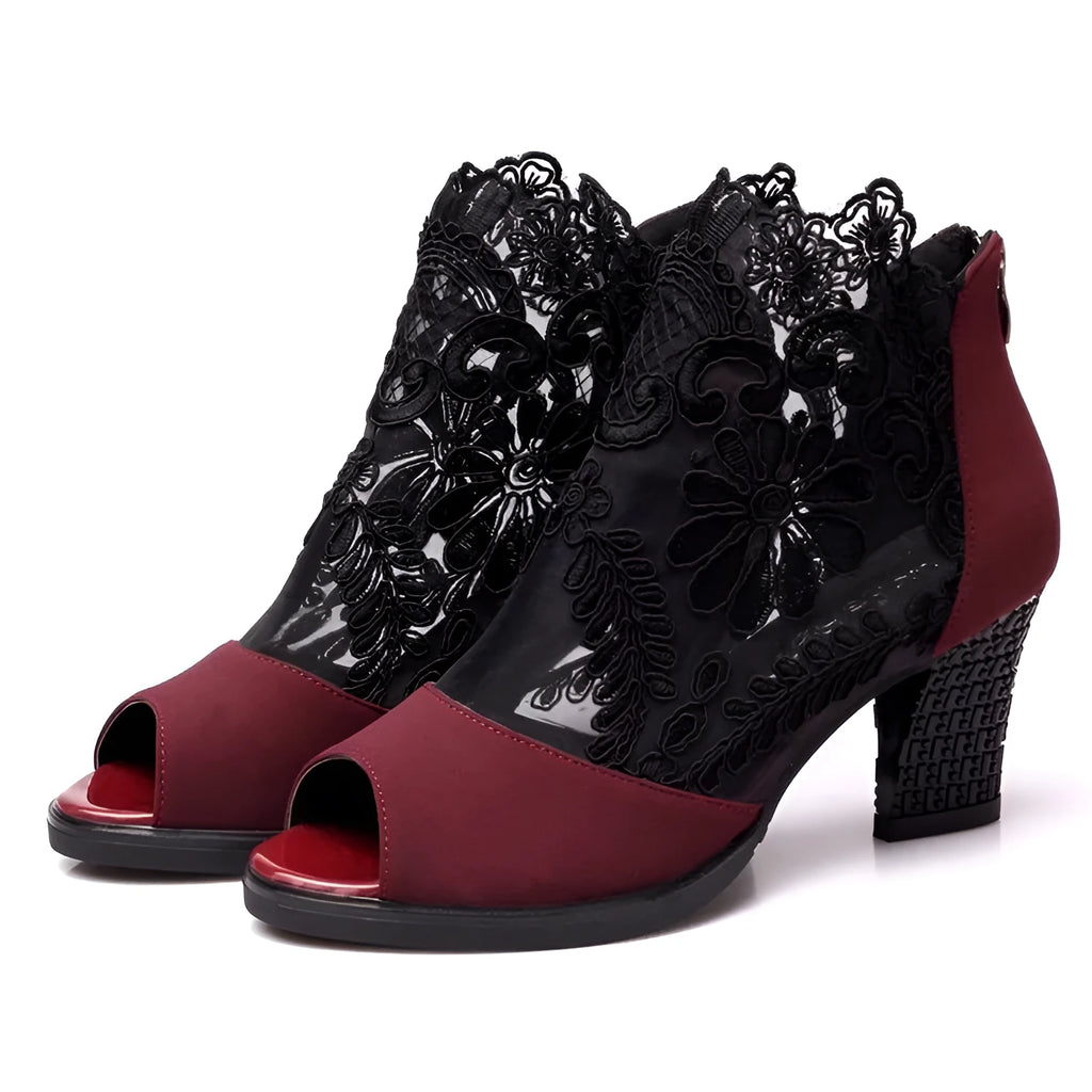 Black women's gladiator sandals with flower lace pattern and square heel on rubber outsole
